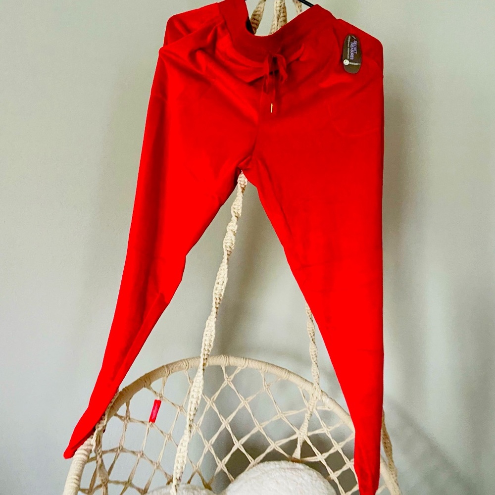 Red pair of velvet sleep pants